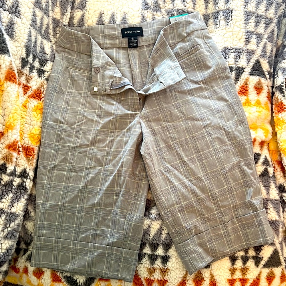 Classic fit walking or “Bermuda” style black and gray plaid shorts